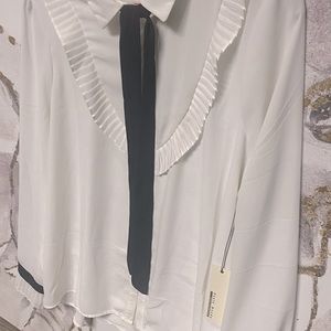 Black and white casual button down top with gold buttons.